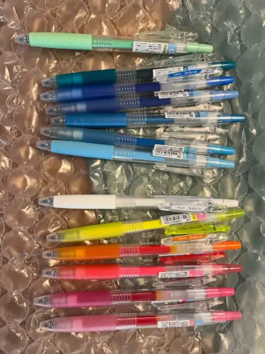 50 adorable blind box pens in a pencil case, 0.5mm black water-based ballpoint pens, non-drying, suitable for exams and studying photo review